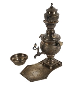 A Persian Incised Metal Coffee Pot and Stand