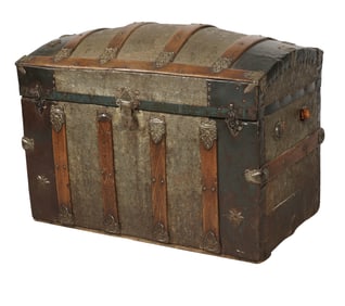 An Antique Embossed Metalp-Clad Steamer Trunk