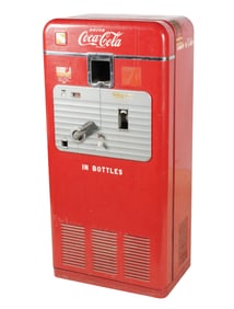 A Vintage Vendorlator CocaCola Vending Machine