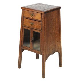 An English Arts and Crafts Oak Game Cabinet