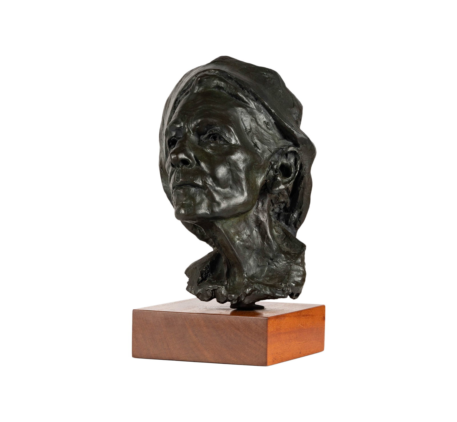A Patinated Bronze Head of a Man: signed, dated and numbered "J.H. 1982 APII", mounted to a wooden plinth 15 x 9 3/4 x 10 1/4 in. (38.1 x 24.8 x 26 cm.), Overall: 17 3/4 x 10 1/4 x 10 1/4 in. (45.1 x 26 x 26 cm.)