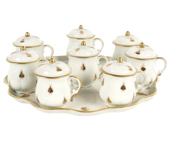 A Set of Eight Limoges Porcelain Pots de Creme