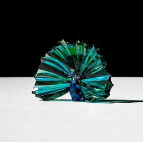 A Swarovski Crystal Arya Peacock Figure