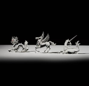 A Group of Three Swarovski Crystal Mythical Beast Figures