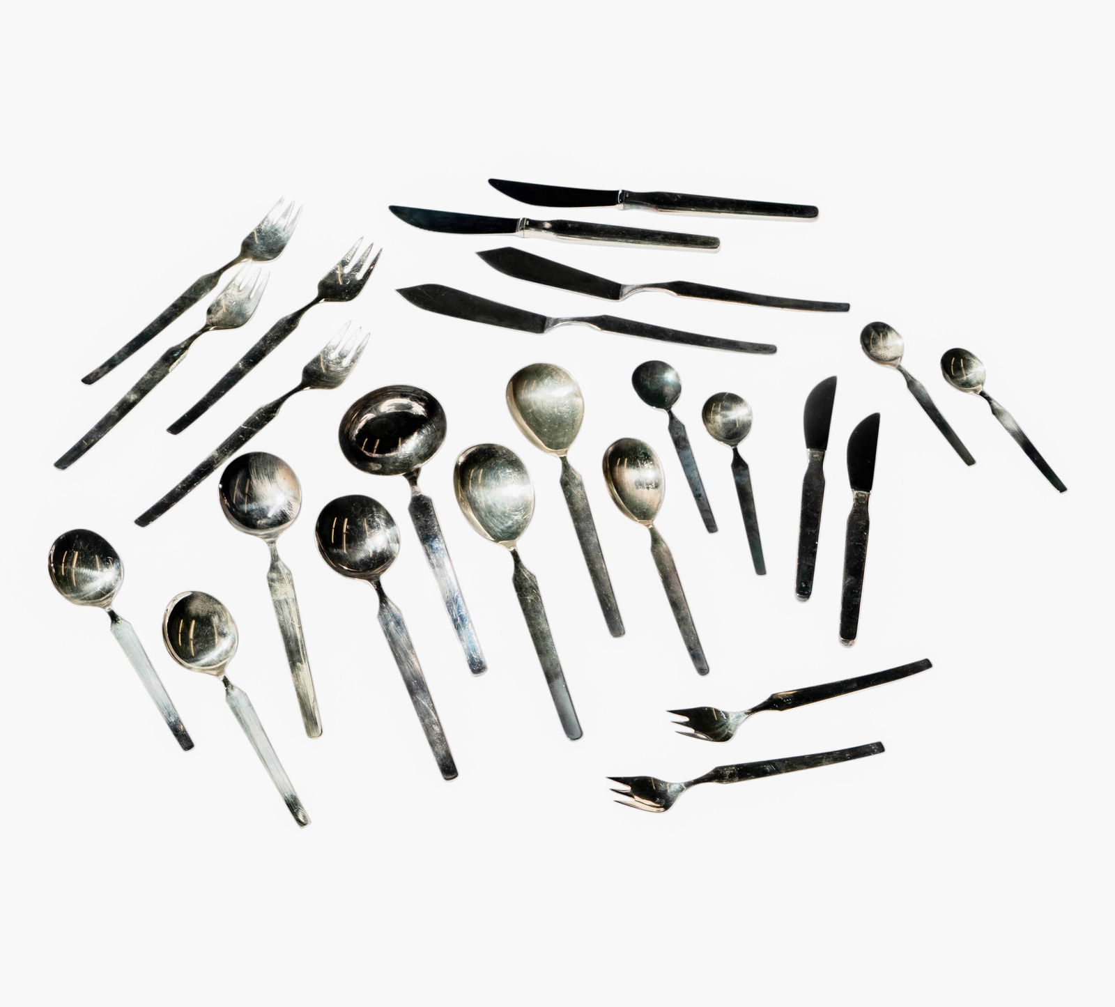 A Swedish Mid-Century .800 Silver Flatware Service for 12: C.G. Hallberg, Stockholm, 1958; comprising 123 pieces (including four serving pieces); each with maker's mark "CGH", town mark, national mark, silver standard, and date mark; Approximately 3,855 grams