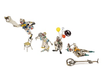 Four Enamel and Silver Clown Figures