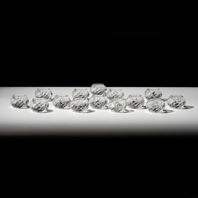 A Set of 14 Baccarat Crystal Napkin Rings