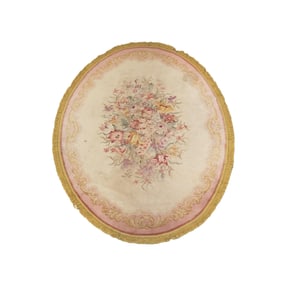 A Continental Oval Floral Rug