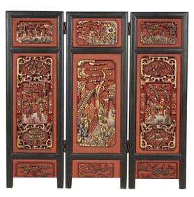 A Chinese Carved Red and Gilt Lacquer Screen