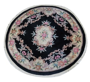 A Round Floral Rug