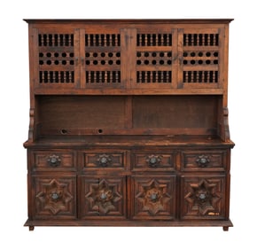 A Spanish Revival Style Carved China Cabinet