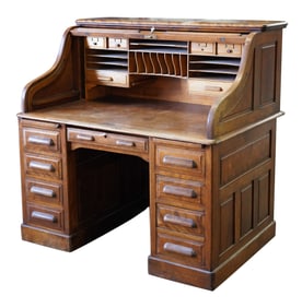 An Oak Roll Top Desk
