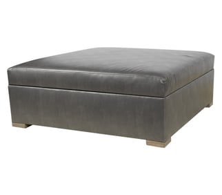 A Large Square Leather Ottoman