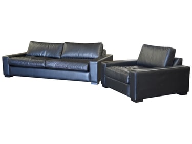 A Contemporary Black Leather Sofa and Lounge Chair