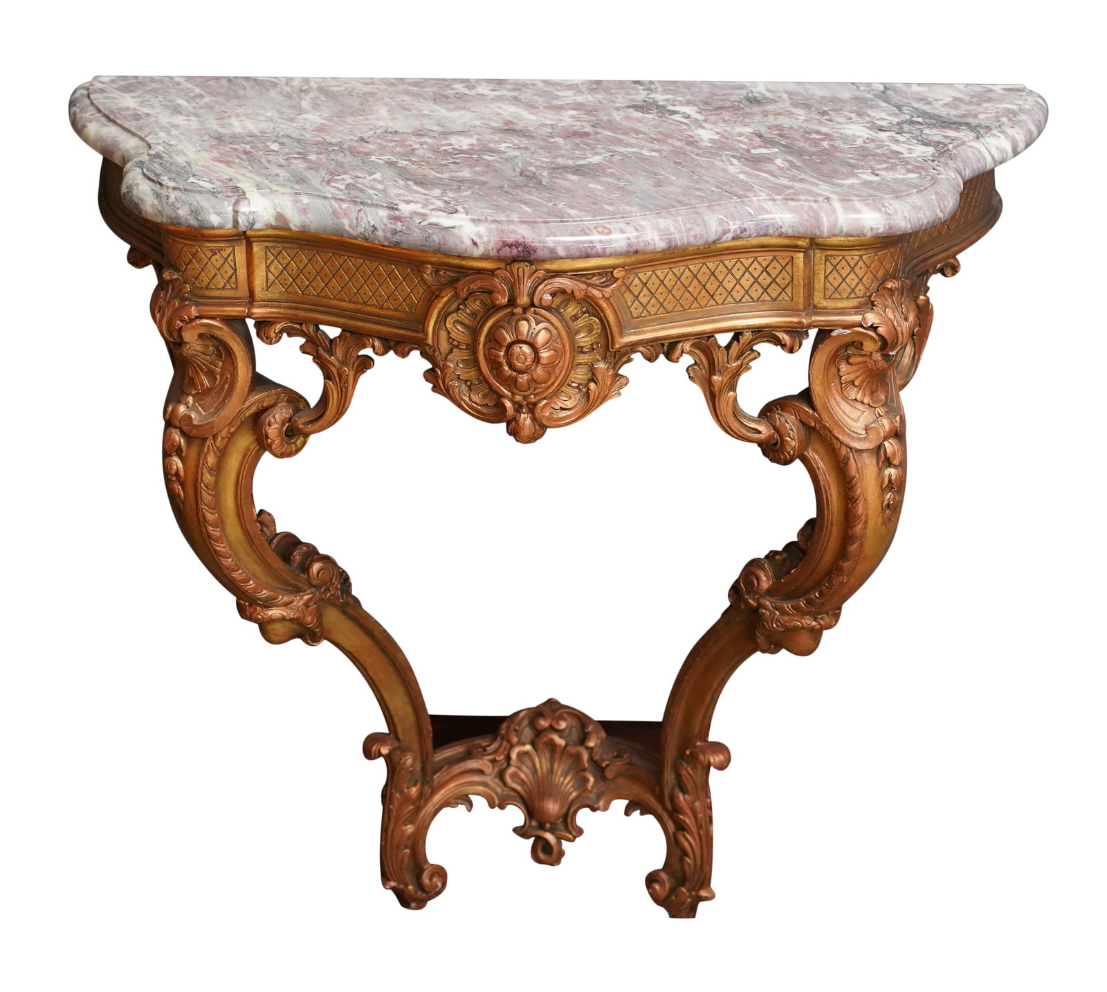 An Italian Rococo-Style Marble-Top Giltwood Console Table: after 1950 30 1/2 x 34 x 16 1/2 in. (77.5 x 86.4 x 41.9 cm.) Notes: This item does not qualify for in-house shipping. Please see our preferred shippers list for quotes or arrange for local pickup. htt