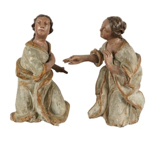 A Pair of Carved and Polychromed Wood Santo Figures