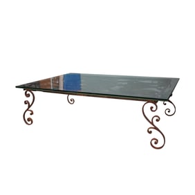 An Iron and Glass Coffee Table