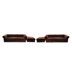A Pair of Tufted Upholstered Sofas with Ottomans