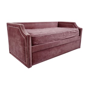 A Pink Upholstered Day Bed