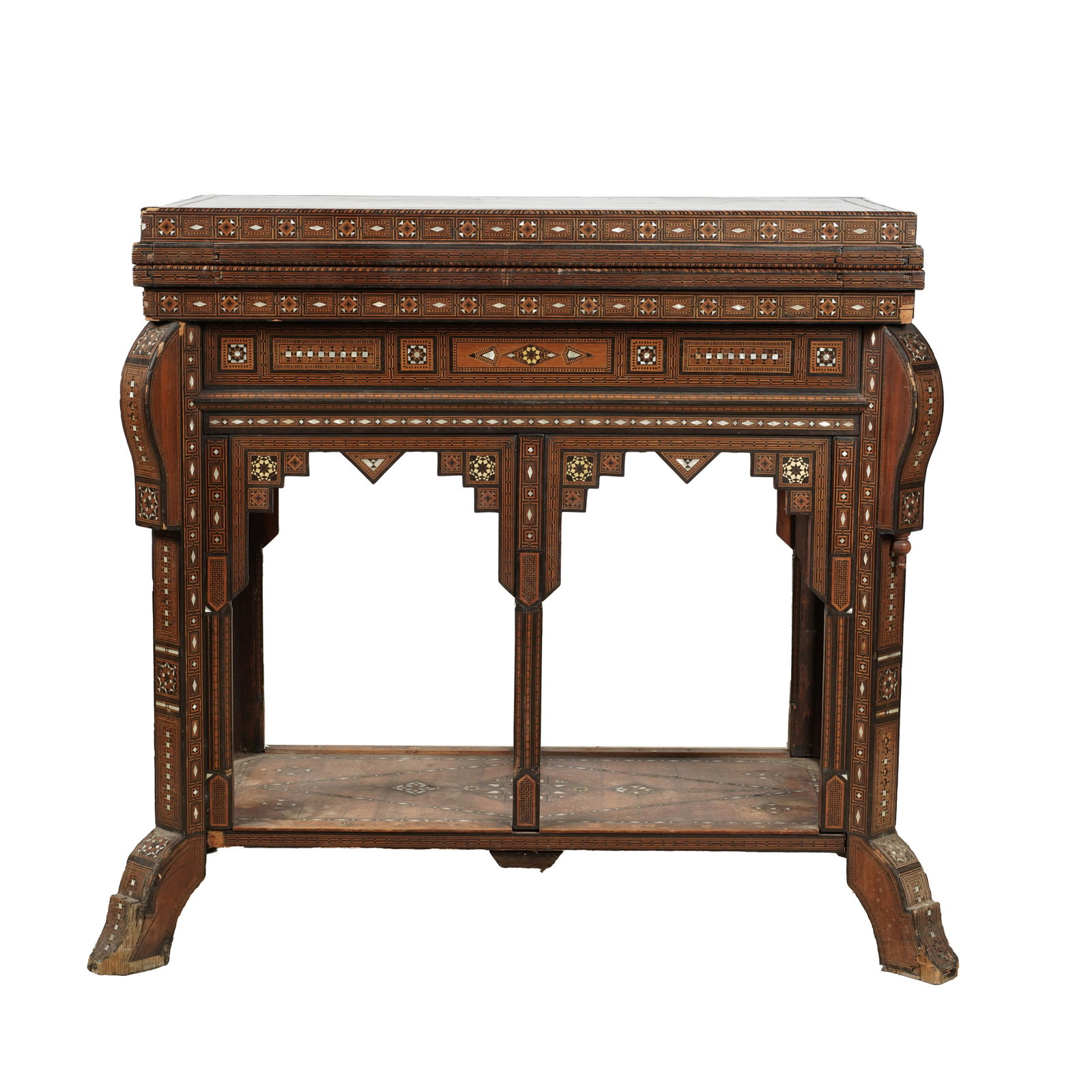 A Moorish Flip Top Game Table: 34 x 21 x 18 in. (86.4 x 53.3 x 45.7 cm.) Note: This item does not qualify for in-house shipping. Please see our preferred shippers list for quotes or arrange for local pickup. https://www.abell.com/b