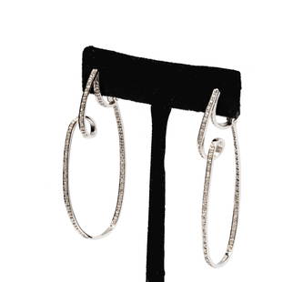 Janis Paige: 14 Karat White Gold Diamond Earrings: set with 122 small round single-cut diamonds[I-J/I2-3] weighing approximately .60 carats total, measuring 56.70mm tall, weighing 8.3 grams; Provenance: The Estate of Janis Paige, Bel Air CA