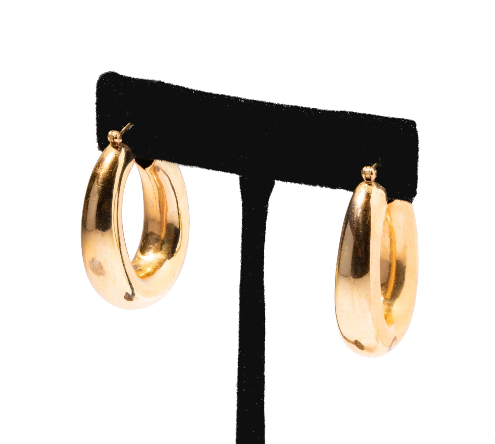 Janis Paige: 14 Karat Yellow Gold Hoop Earrings: earrings measuring 35.48mm tall by 9.05mm wide, weighing 18.6 grams; Provenance: The Estate of Janis Paige, Bel Air CA,