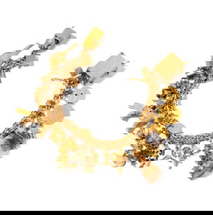Janis Paige: 14 Karat Yellow Gold Charm Bracelet: measuring 7 inches long, weighing 108 grams; Provenance: The Estate of Janis Paige, Bel Air CA,