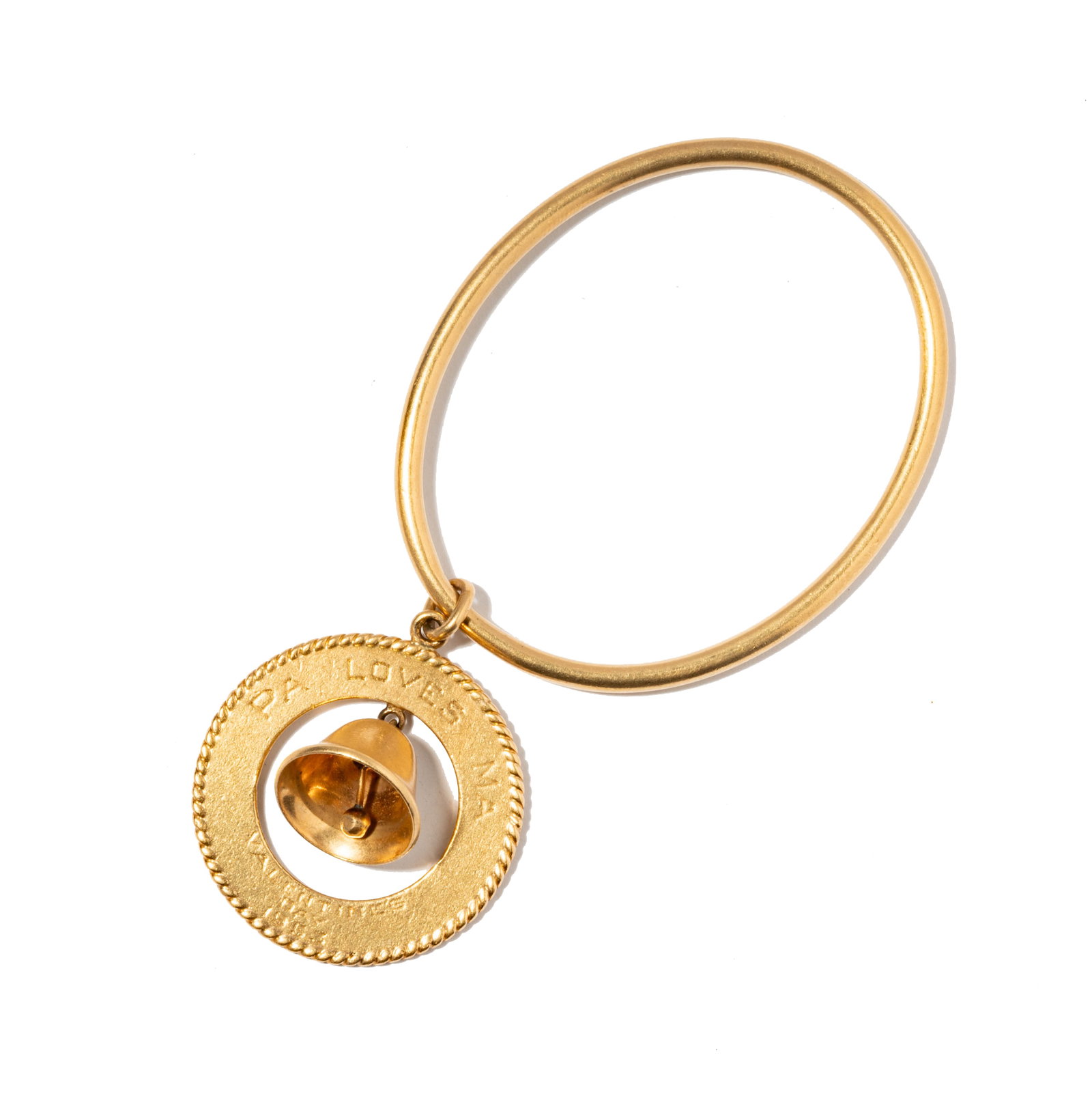 Janis Paige: 14 Karat Yellow Gold Charm Bangle Bracelet: with attached pendant measuring 47.18mm tal including bale but 39.05mm in diameter, bracelet measuring 7 inches inside circumference, weighing 42.8 grams Provenance: The Estate of Janis Paige, Bel Air