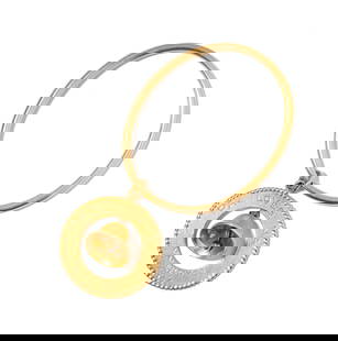 Janis Paige: 14 Karat Yellow Gold Charm Bangle Bracelet: with attached pendant measuring 47.18mm tal including bale but 39.05mm in diameter, bracelet measuring 7 inches inside circumference, weighing 42.8 grams Provenance: The Estate of Janis Paige, Bel