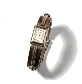 Janis Paige: Gucci Sterling Silver and Wood Belt Watch