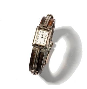 Janis Paige: Gucci Sterling Silver and Wood Belt Watch: case measuring 21.52mm wide including crown, measuring 9 inches long; Provenance: The Estate of Janis Paige, Bel Air CA,