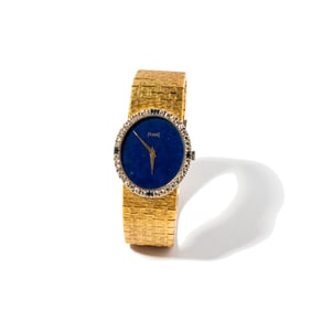 Janis Paige: Piaget 18 Karat Yellow Gold, Diamond and Lapis Lazuli Watch