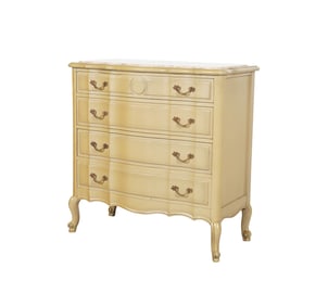 Janis Paige: A Louis XV-Style Marble-Top Chest of Drawers