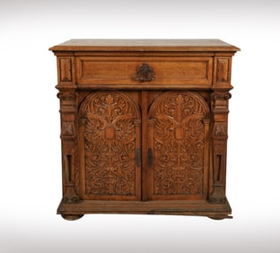 Janis Paige: A Renaissance Revival Style Carved Oak Cabinet