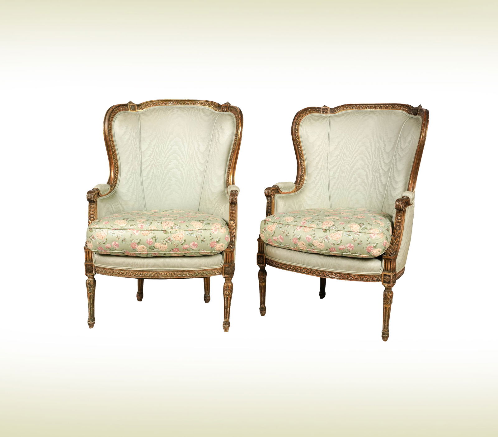 Janis Paige: A Pair of Louis XVI-Style Giltwood Bergeres: 19th century, with later custom upholstery by Star Upholstery Co. 41 x 29 x 22 in. (104.1 x 73.7 x 55.9 cm.); Seat height: 21 in. Provenance: The Estate of Janis Paige, Bel Air CA