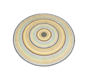 Janis Paige: A MacKenzie-Childs Round Braided Rug 72 in. Dia.