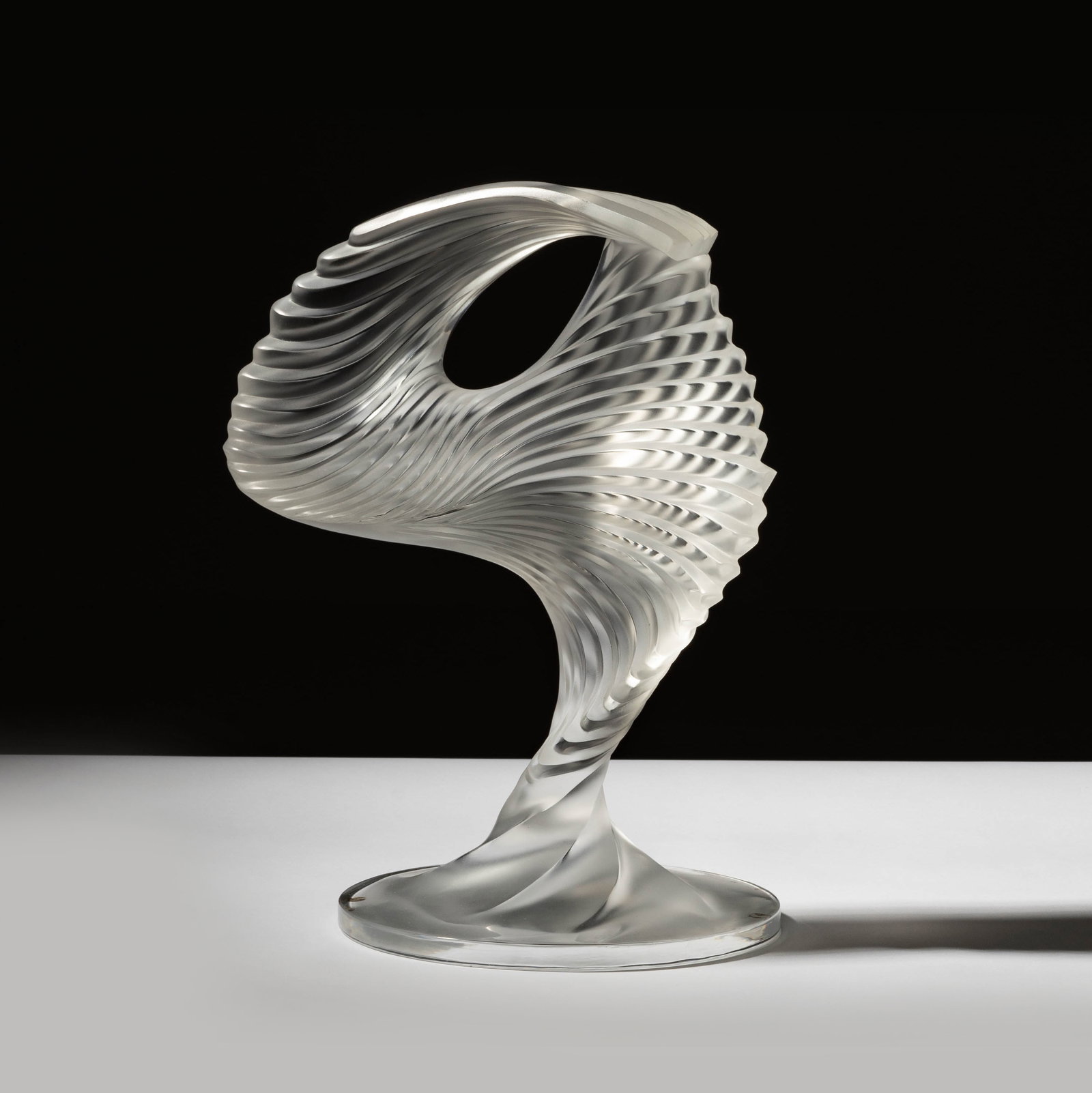 A Lalique Glass Trophee Sculpture: after 1945; signed "Lalique France" to underside 12 3/4 x 9 x 7 1/4 in. (32.4 x 22.9 x 18.4 cm.) Provenance: The Estate of Amalia Wechselmann, Beverly Hills, CA