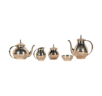 A Salvador de la Serna Mexican Sterling Tea/Coffee Service: Mexico City, c. 1940; comprising a coffee pot (9 1/4 x 9 in.), a teapot (7 1/2 x 10 in.), a covered sugar (6 x 3 3/4 in.), a creamer (5 x 4 1/2 in.), and a waste bowl (1 7/8 x 4 5/8 in.); each with Ea
