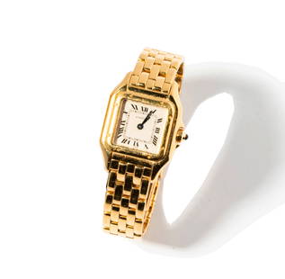 Cartier 18 Karat Yellow Gold Panthere Ladies Watch: case measuring 24.82mm wide including crown, bracelet measuring 6-1/4 inches by 12.04mm wide, weighing 67.4 grams; model: 1070