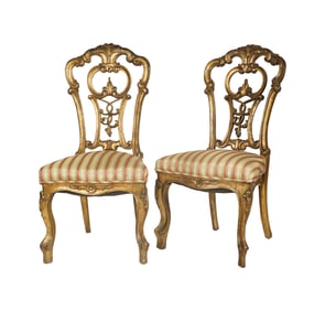 A Pair of Italian Carved Giltwood Slipper Chairs