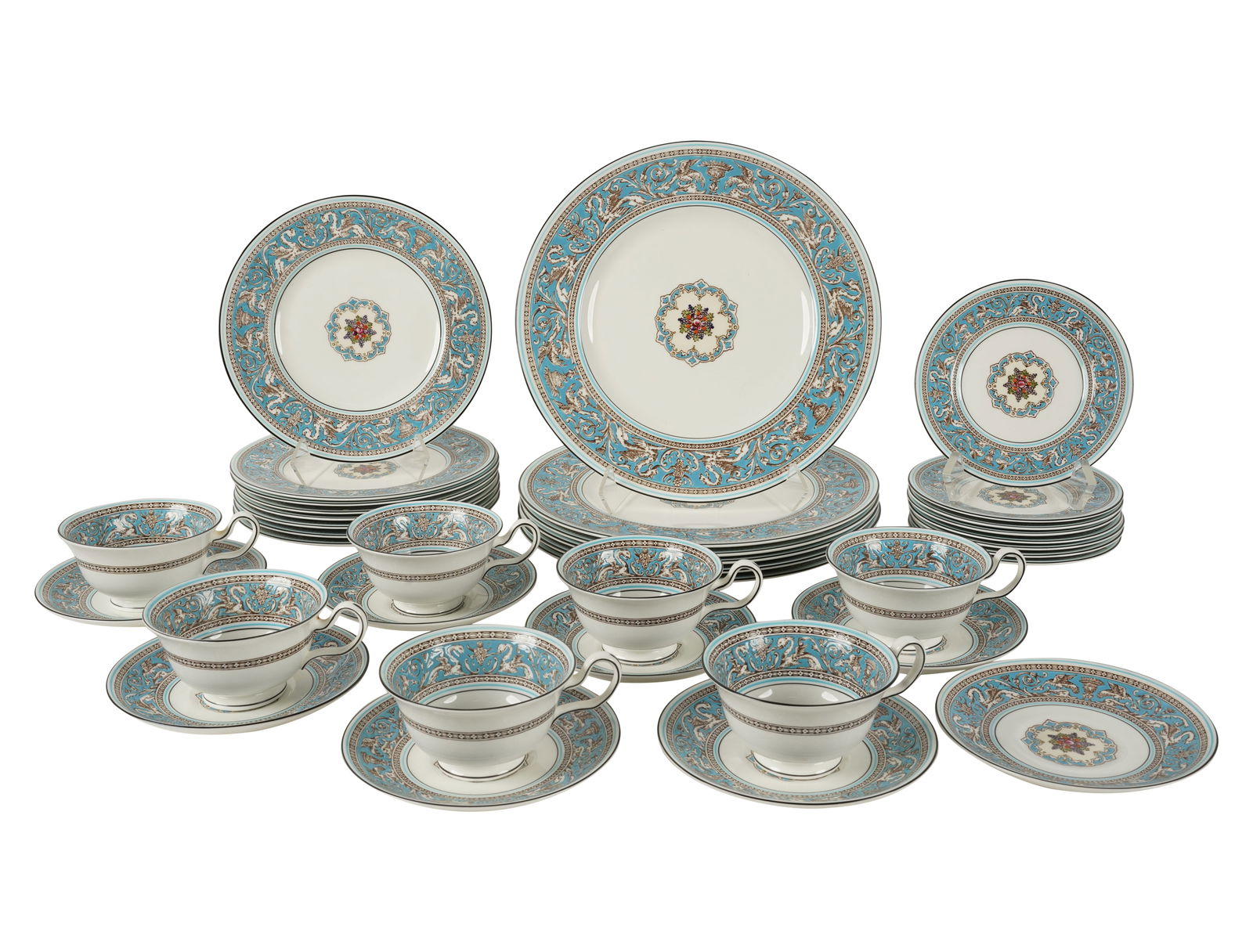 A Wedgwood Florentine Porcelain Partial Service: with printed factory marks [36 pieces] Notes: This item does not qualify for in-house shipping. Please see our preferred shippers' list for quotes or arrange for local pickup. https://www.abell.com/bu