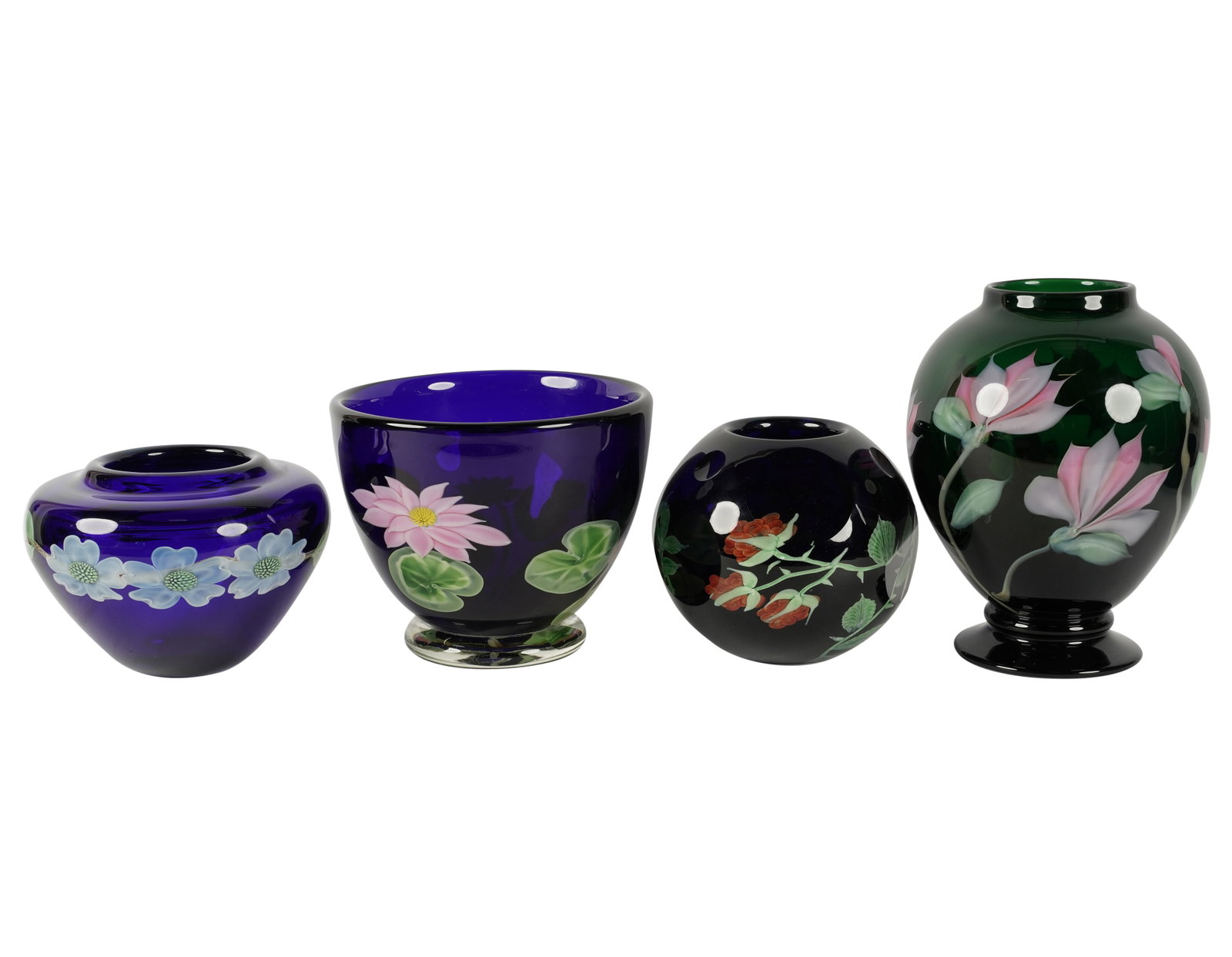 Four Orient and Flume Glass Vases: two in green, two in blue; each decorated with flowers; each marked Tallest: 9 1/2 x 6 1/2 in. (24.1 x 16.5 cm.)