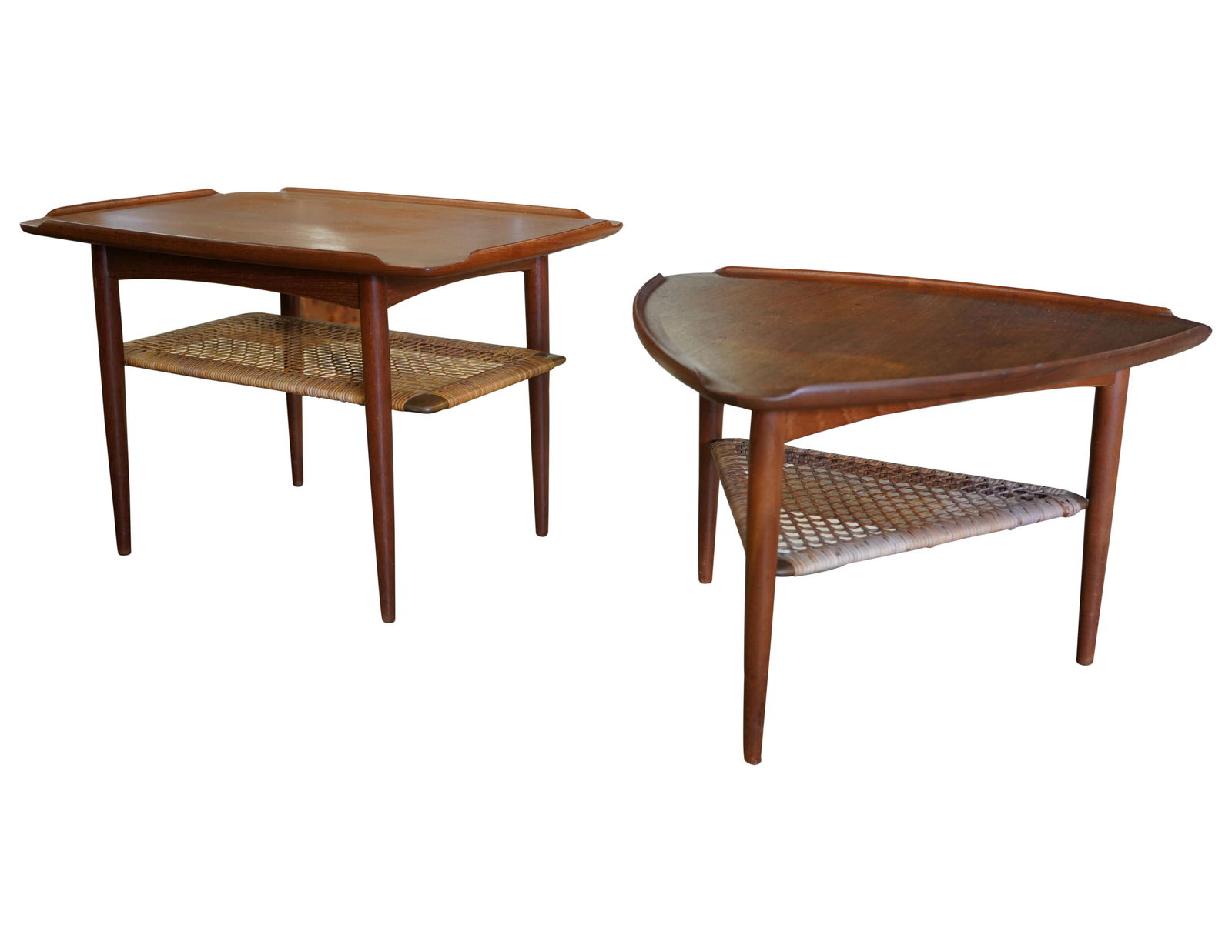 Poul Jensen for Selig: Two Teak End Tables: Denmark, mid 20th century; each with woven undershelf; each with label to underside; one with rectangular top, 19 1/4 x 30 x 20 in. (48.9 x 76.2 x 50.8 cm.), the other with triangular top, 17 x 26 3/4
