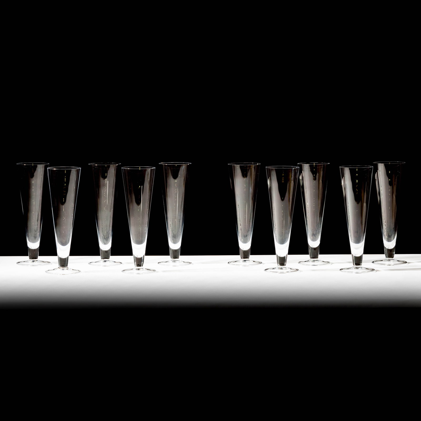 Ten Tiffany and Co. Crystal Pilsner Glasses: each marked Each: 9 3/4 x 3 3/8 in. (24.8 x 8.6 cm.)