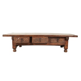 A Spanish Colonial-Style Carved Wood and Iron Coffee Table