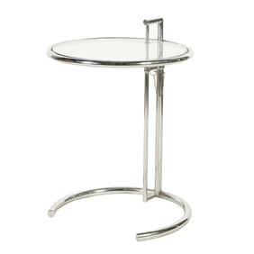 A Chrome and Glass Side Table and an Armchair