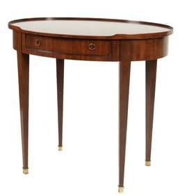A Baker Sheraton-Style Mahogany Oval Lamp Table
