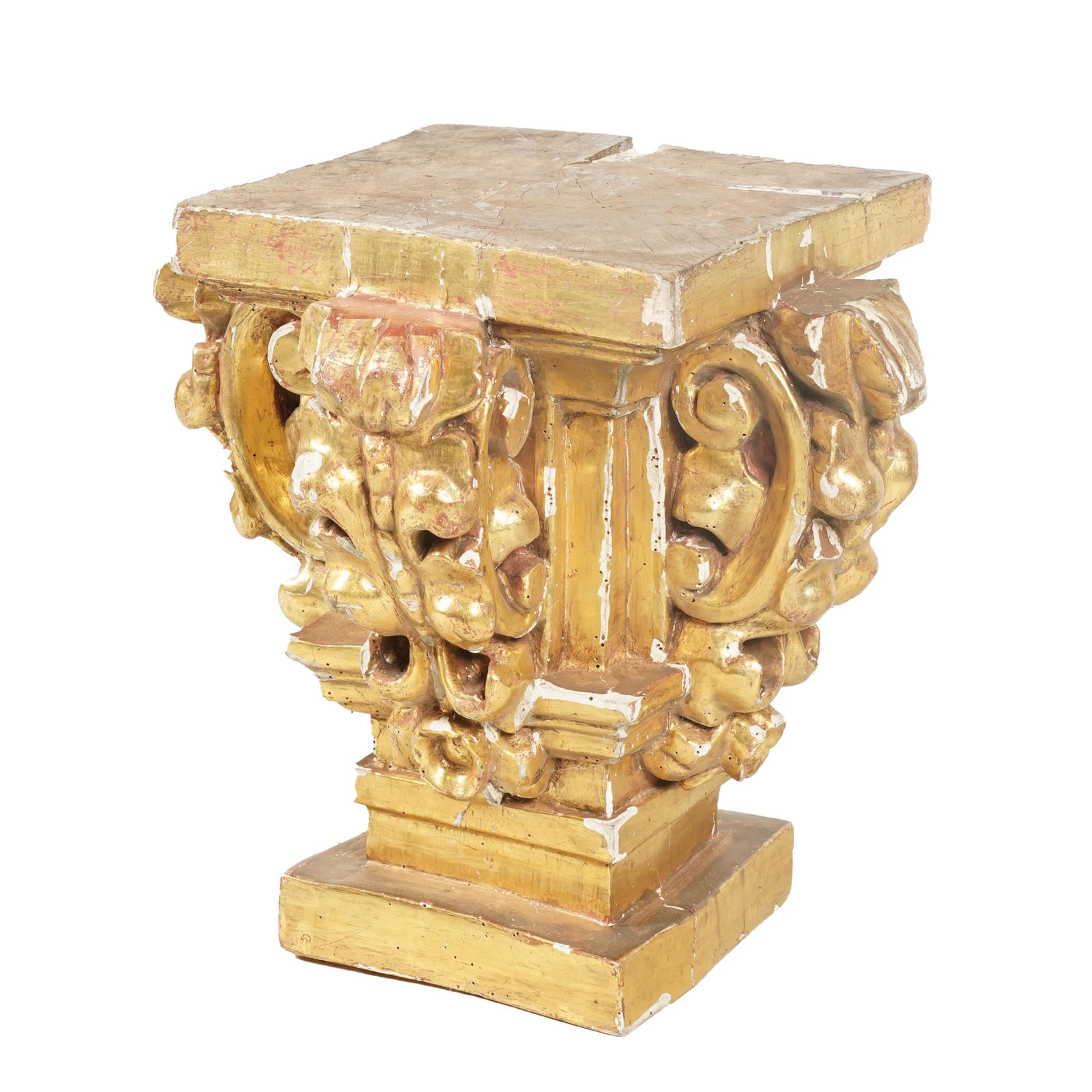 An Antique Carved Giltwood and Gesso Capital: with square top 20 1/2 x 20 x 22 in. (52.1 x 50.8 x 55.9 cm.) Notes: This item does not qualify for in-house shipping. Please see our preferred shippers' list for quotes or arrange for local pickup. h