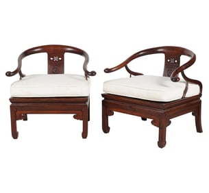 A Pair of Chinese Hardwood Horseshoe Back Chairs