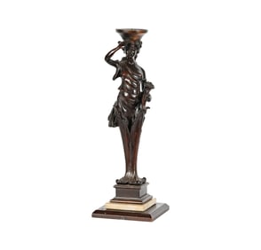 A Carved Wood Figural Pricket Stick